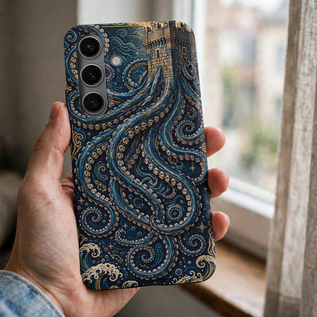 The Kraken's Embrace premium tough phone case on a phone held in a hand by a window, showing the dark kraken tentacle design on the case back