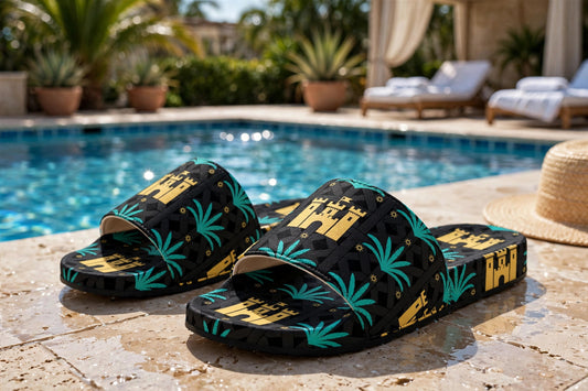 Women's slide sandals with new tropical print, on a pool deck