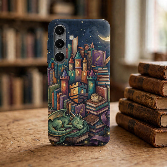 Book Castle at Night premium tough phone case on a wooden library desk