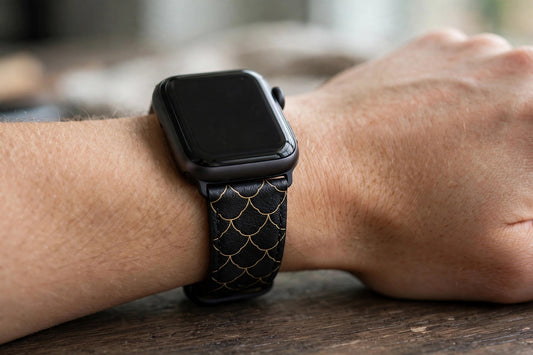 Fáfnir Scale Apple Watch strap worn on a wrist
