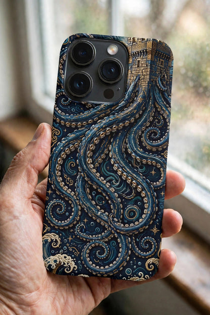 The Kraken's Embrace premium snap phone case on a phone held in a hand by a window, showing the dark kraken tentacle design on the case back