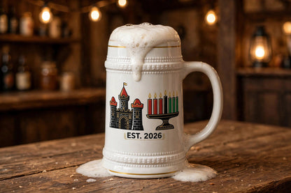 Kwanzaa Castle beer stein filled with foaming beer on a tavern table, castle and kinara design with EST. 2026