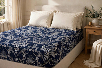 Night Watch Fitted Sheets — Winter Palace: printed navy damask fitted sheet covering the mattress, plain cream pillows, no duvet