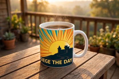 Siege the Day mug filled with coffee on a porch table at sunrise, orange sunrise over a castle hill